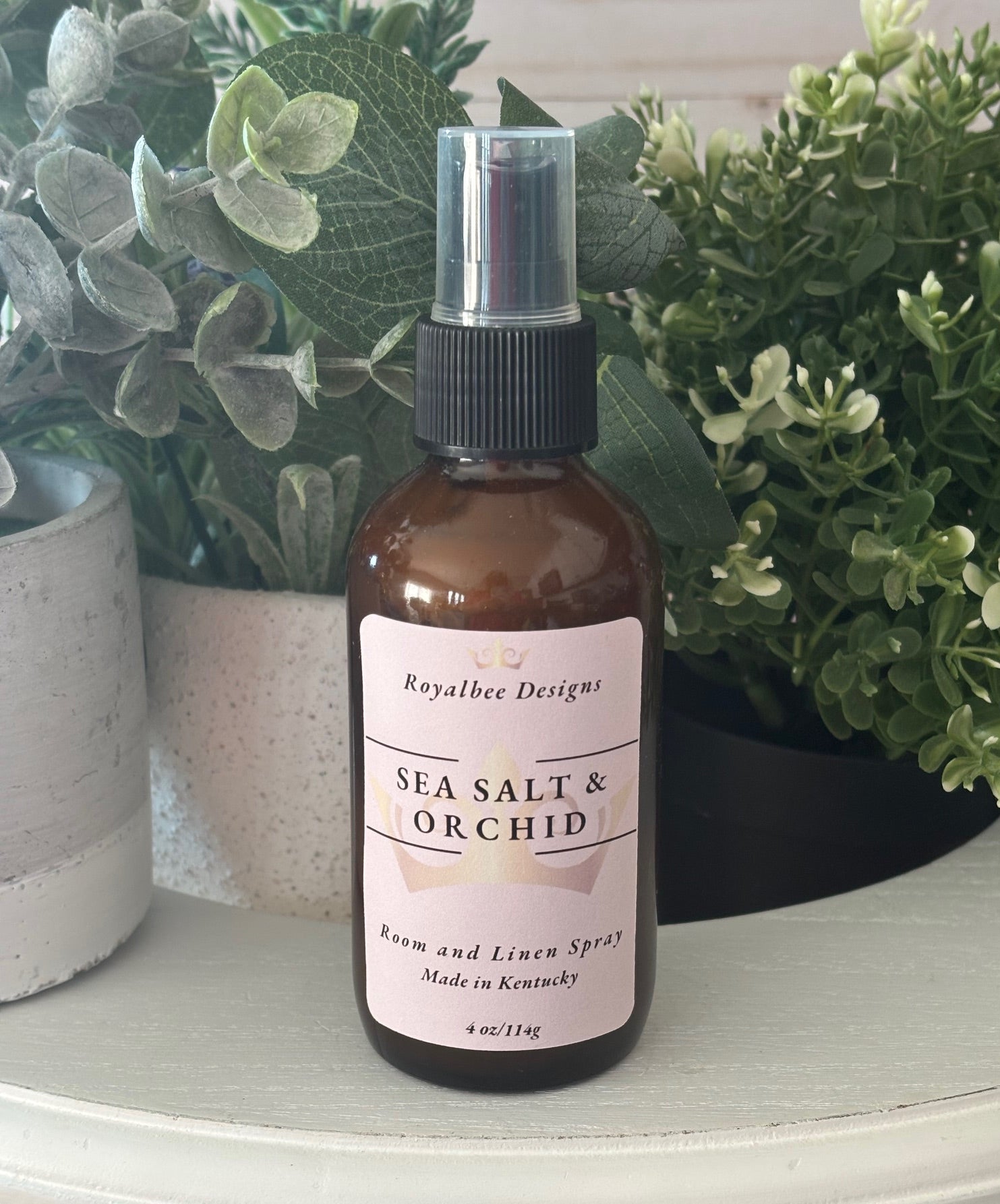 Bottle of 'Sea Salt & Orchid' room and linen spray sold by Royalbee Designs
