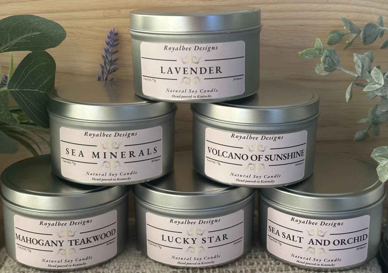 Royalbee Designs Collection of candles in metal tins with labels 