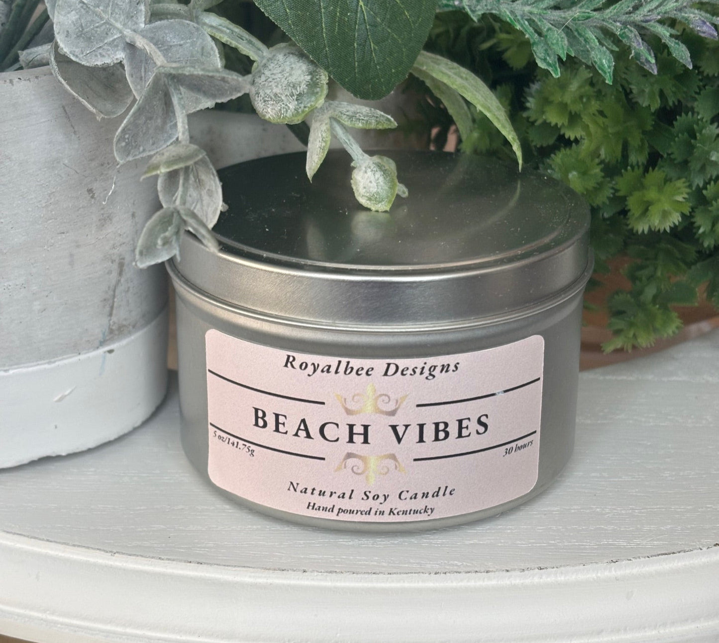 tin candle sold by Royalbee Designs labeled 'Beach Vibes'