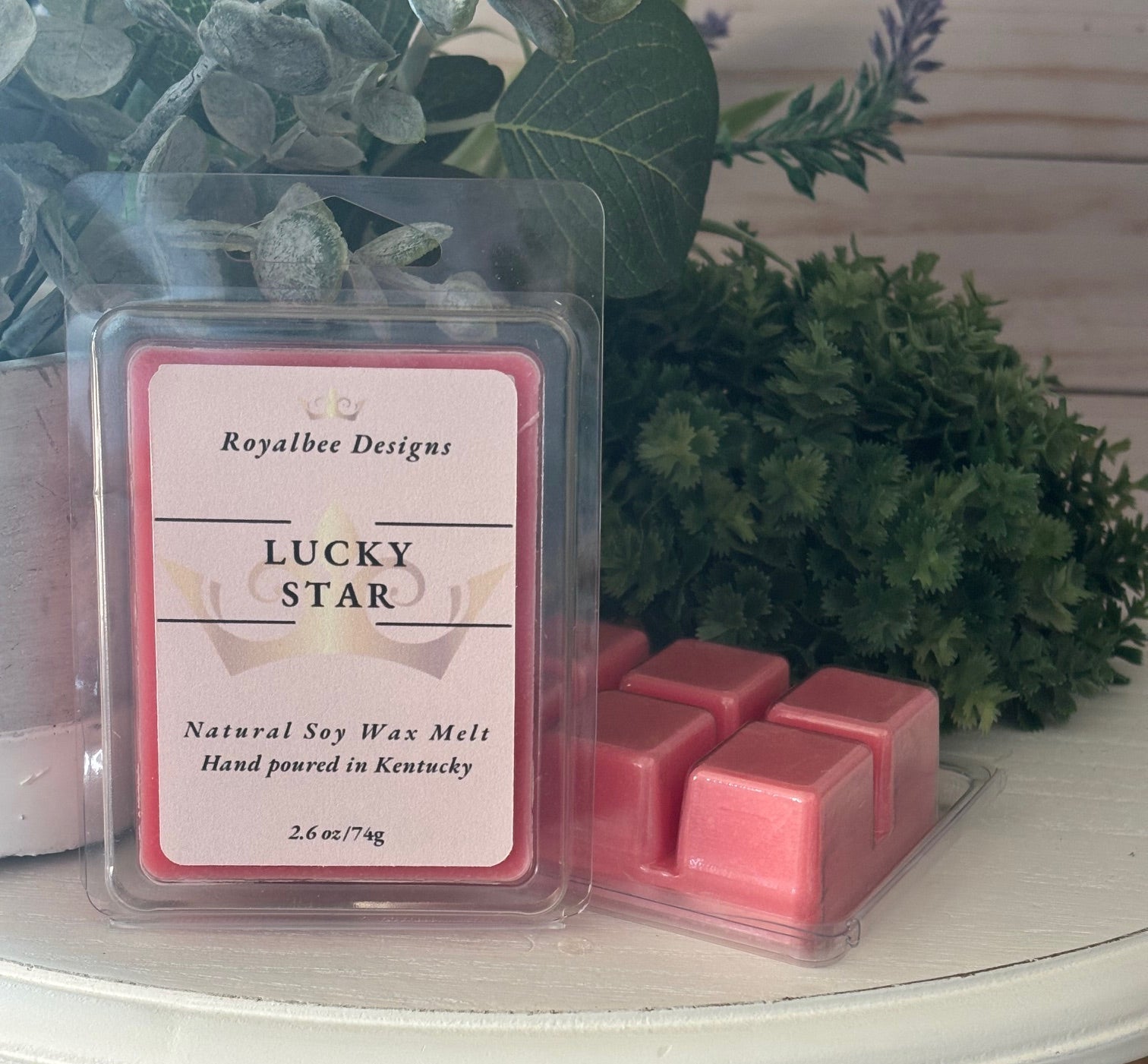 Pink wax melts in a clear packaging labeled 'Lucky Star' sold by Royalbee Designs