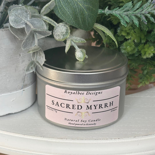 Candle  labeled 'Sacred Myrrh' sold by Royalbee Designs